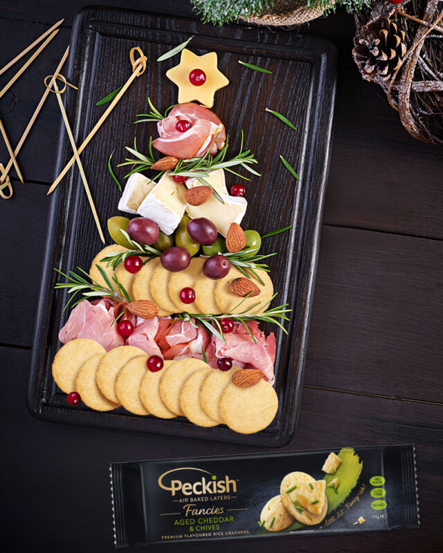 Make a statement this festive season with Peckish Fancies 🎄  Our delicious Aged Cheddar & Chives crackers are so full of flavour they'll bring joy to your Christmas platters and charcuterie boards!  #ThinnerLighterCrispier #Snack #Crackers #FeelingPeckish